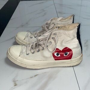 Cool vintage style Comme des Garçons PLAY and Converse features classic Chucks